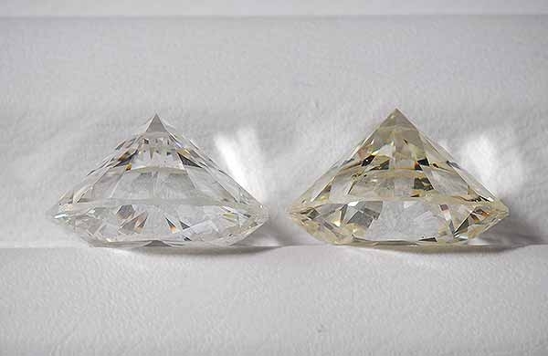Comparison of round brilliant cut diamonds with very different color by Ascot Diamonds