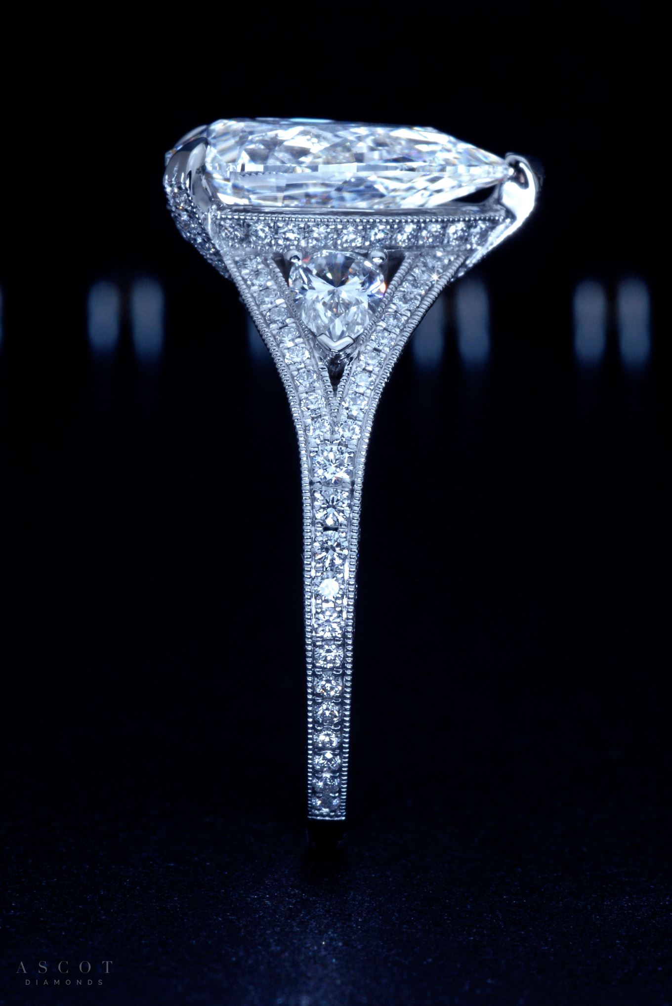 Micropave Pear Shaped Diamond Engagement Ring