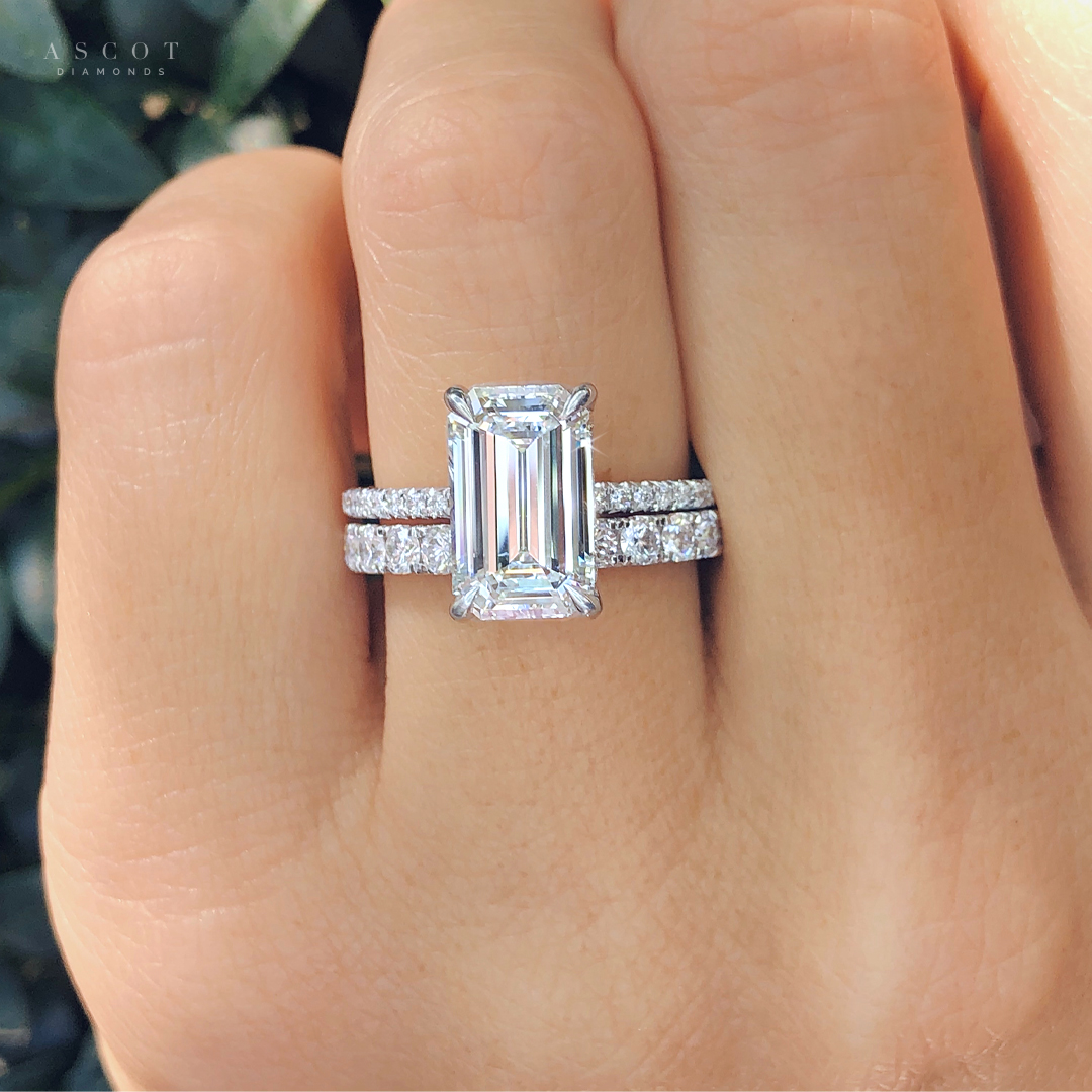 lab grown diamond emerald cut engagement ring and ladies eternity diamond band
